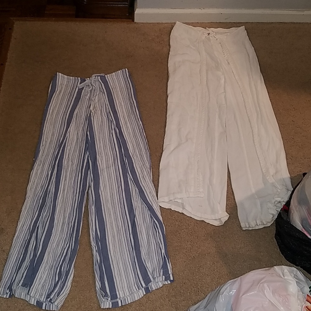 Two pair of split front pull on pants